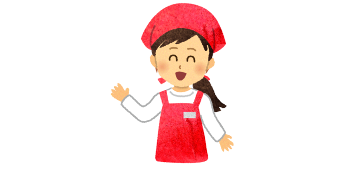 笑顔で案内する女性スタッフ