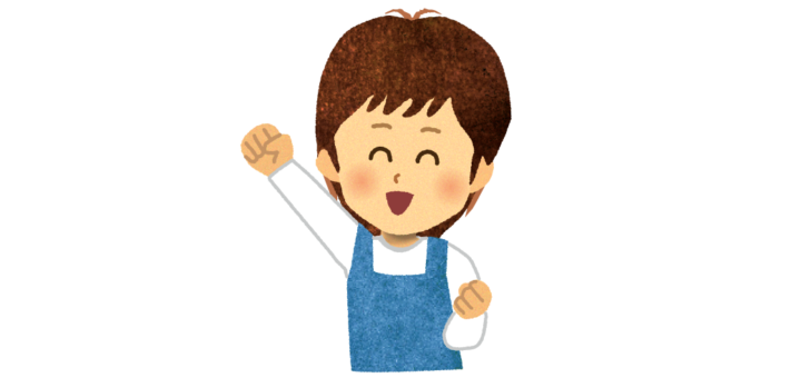 ガッツポーズをする介護士