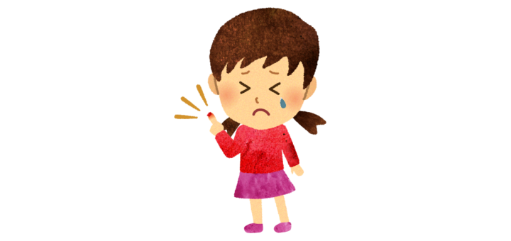 指を怪我して泣いている女の子のイラスト