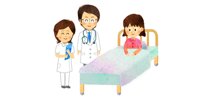 回診しているお医者さんと入院中の女の子